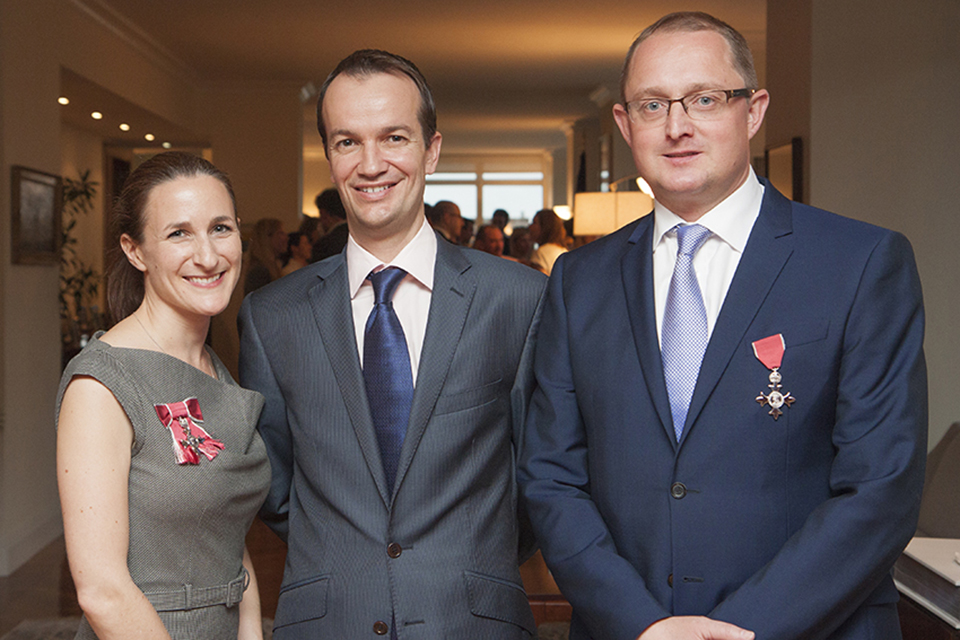 Rebecca Cousins, MBE, Consul General Danny Lopez, and Rich Sexton, MBE