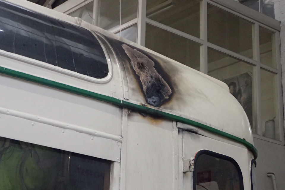 External scorching to the bodywork of tram 272. A large patch of blackened paintwork can be seen.