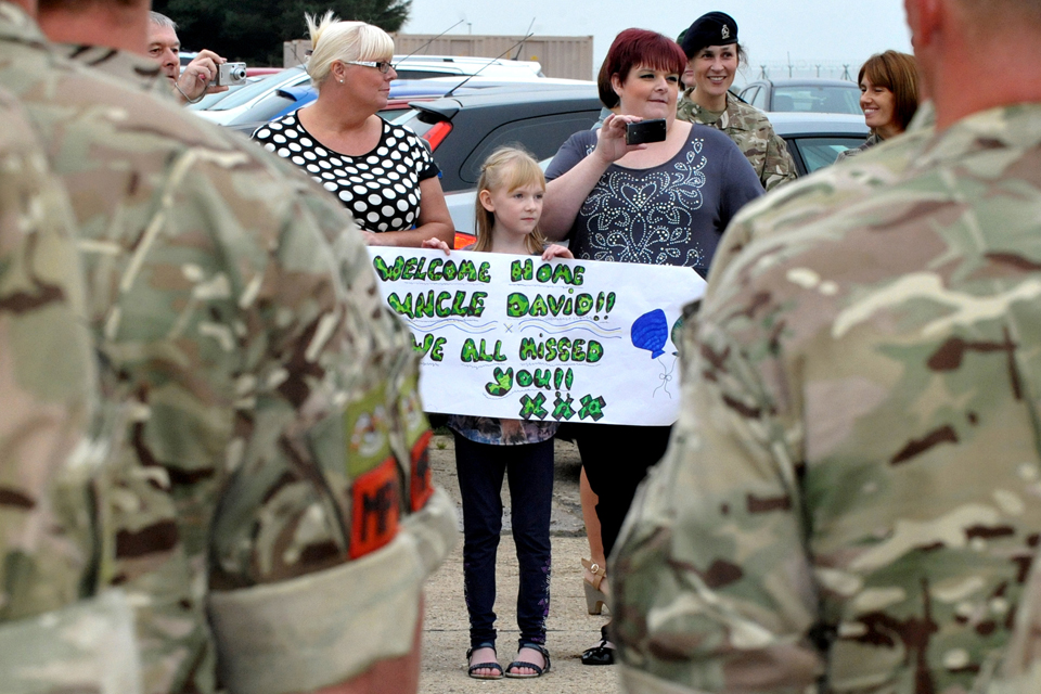 Family members and friends welcome soldiers