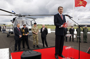 Defence Secretary Philip Hammond officially receives the first AW159 Wildcat helicopters from AgustaWestland on behalf of the Armed Forces at the Farnborough International Airshow