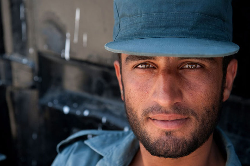 An Afghan policeman on the day of his graduation from the Helmand Police Training Centre in Lashkar Gah