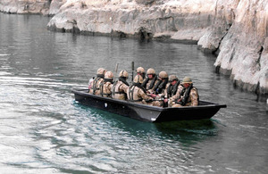 Soldiers from 3rd Battalion The Rifles aboard an assault boat on Kajaki's lake earlier this year