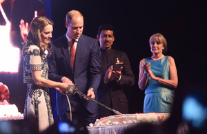 The Duke and Duchess of Cambridge cut a cake to celebrate HM The Queen's 90th birthday