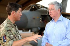 Defence Secretary Michael Fallon meets the commanding officer of 904 Expeditionary Air Wing at Kandahar Airfield [Picture: Corporal Chantelle Cooke RAF, Crown copyright]