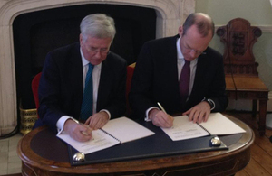 Michael Fallon and Simon Coveney signing a Memorandum of Understanding [Picture: Crown copyright]