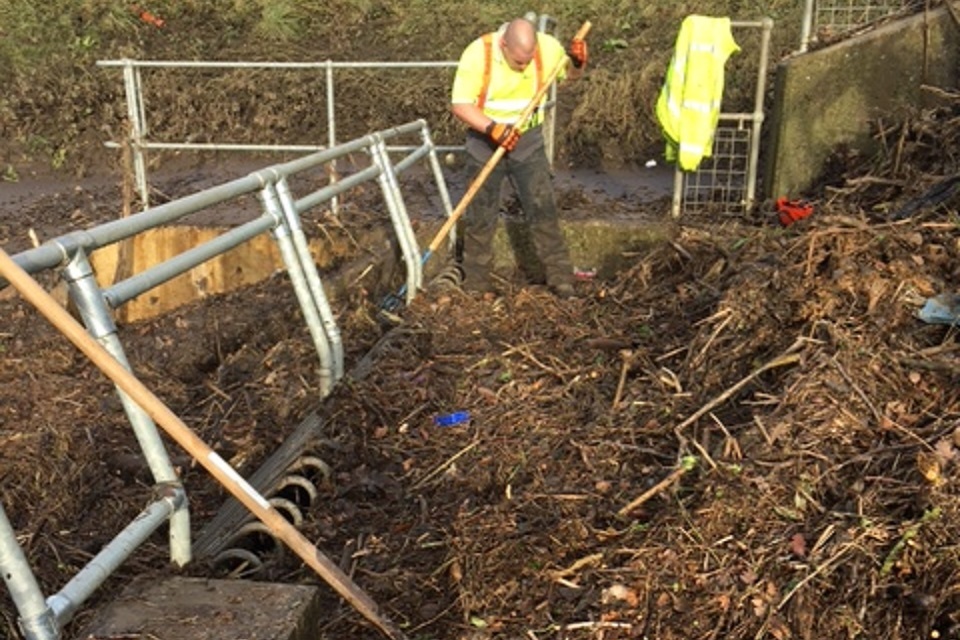 Clean up takes place following heavy rainfall