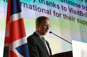 Brian Davidson presented opening remarks at the Queen's Birthday Party in Shanghai.