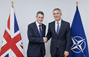 UK Defence Secretary Gavin Williamson (left), shaking hands with the NATO Secretary General, Jens Stoltenberg (right).