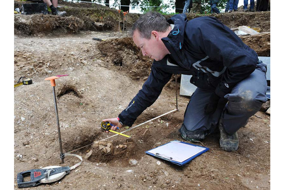 A soldier injured in Afghanistan carefully surveys and records Bronze Age and Anglo-Saxon deposits found during the excavation of Barrow Clump on Salisbury Plain 