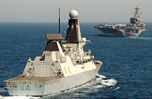 HMS Defender and US aircraft carrier USS George H W Bush [Picture: Leading Airman (Photographer) Dan Rosenbaum, Crown copyright]