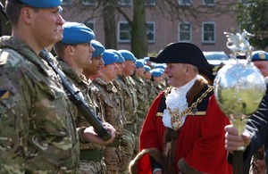 Wrexham's Lord Mayor greets soldiers outside the town's Guildhall