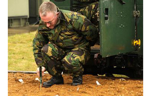 A member of 31 Squadron engaged in counter-improvised explosive device training