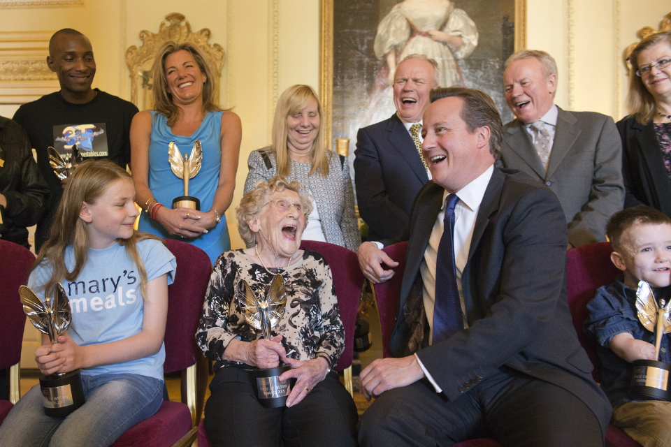 David Cameron with Pride of Britain Award winners 2013