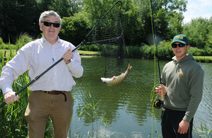 Sapper Will Coldrick from 26 Engineer Regiment (right) with Instructor Jim Steele shows off a fine 1.4kg Rainbow Trout caught during the inaugural Fishing 4 Forces day at Avon Springs Fisheries, Durrington