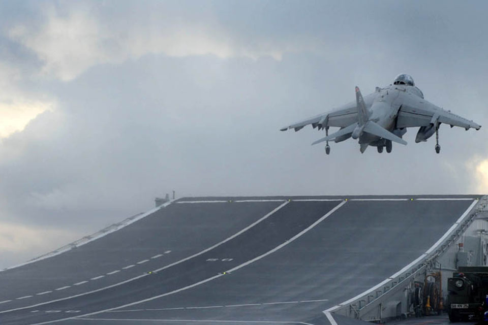 A Harrier GR9 belonging to 1 (Fighter) Squadron RAF launches off the deck of HMS Ark Royal for the last time