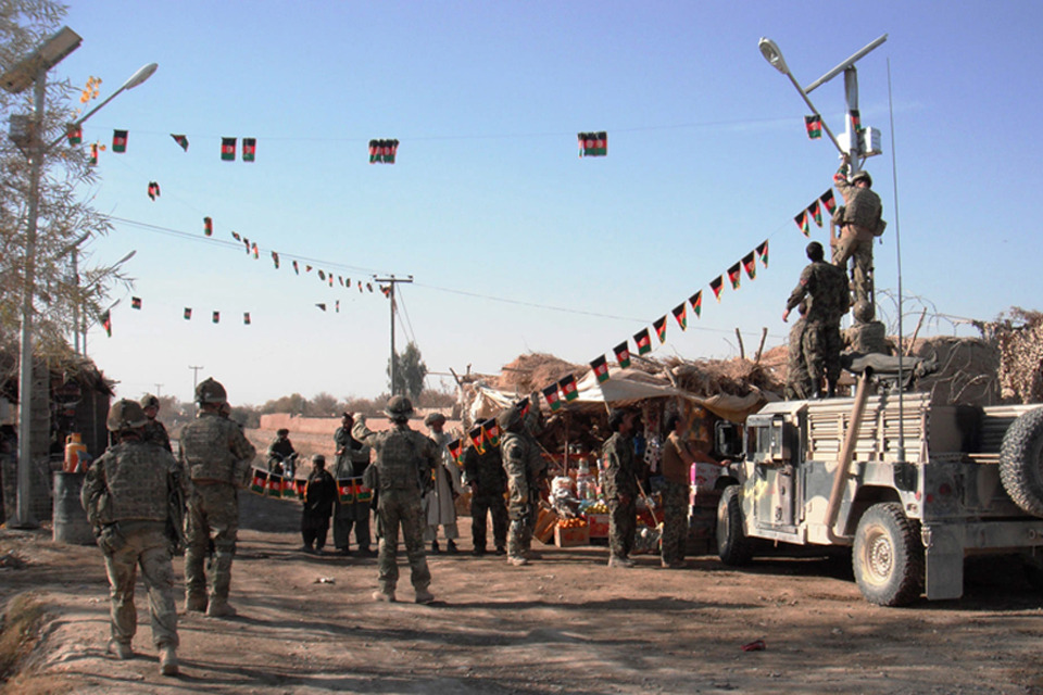 British and Afghans fly flags of defiance