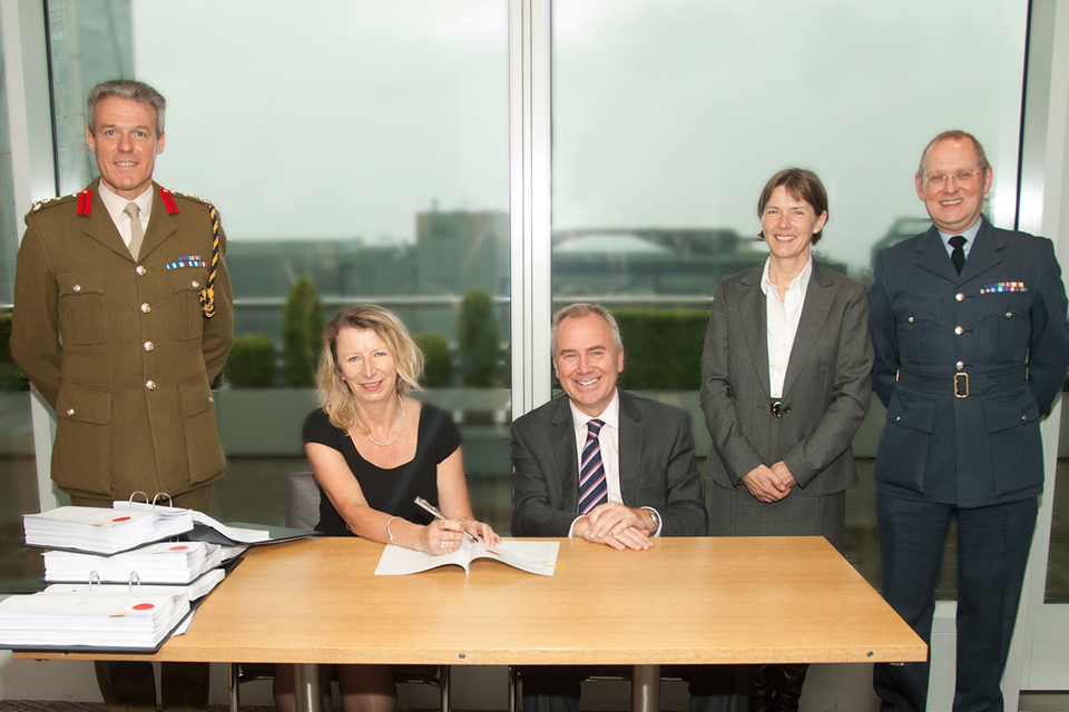 Signing the contract awarding construction of the college to Skanska