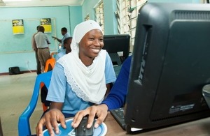 Image of woman using ICT infrastructure.