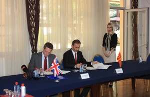 Ambassador Yvon and minister Ademi sign Memorandum of Understanding for project support.