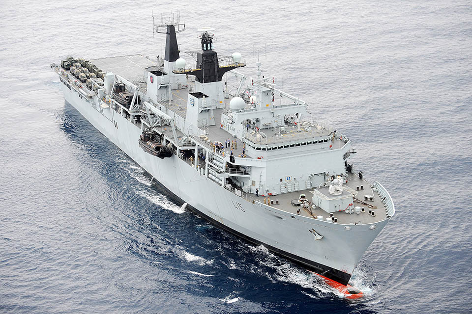 HMS Bulwark and Merlin helicopters ready for operations in the Mediterranean