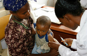Boy receives vaccines