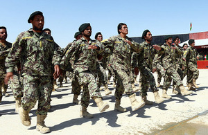 Afghan troops parade at the opening ceremony of the 215 Regional Corps Battle School [Picture: Sergeant Dan Bardsley, Crown copyright]