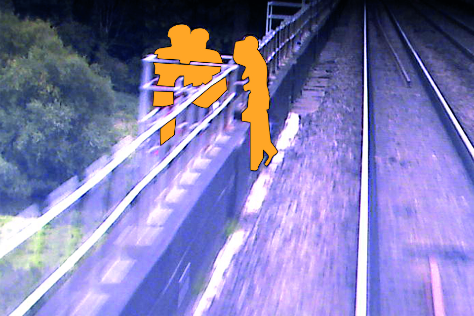 Image from forward-facing camera on train 9M84 as it crosses the viaduct. The group of line-side workers moving clear are represented by yellow outlines as the move to a refuge (image courtesy of Virgin Trains)