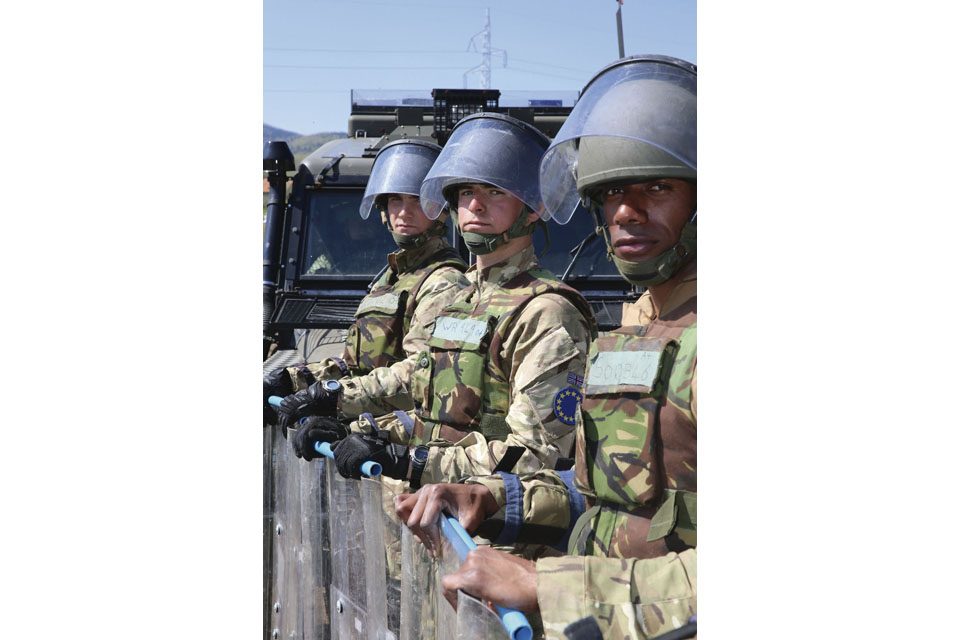 Soldiers of the Irish Guards wearing protective equipment