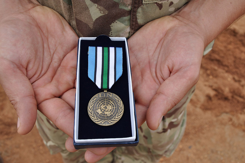 The UNMISS medal which has been presented to troops from Op TRENTON 2 in Juba, South Sudan. Crown copyright.