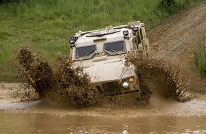 Husky protected support vehicle tackles the deep water obstacle at the Millbrook Proving Ground, Bedfordshire [Picture: Kathryn Stewart, Crown copyright]