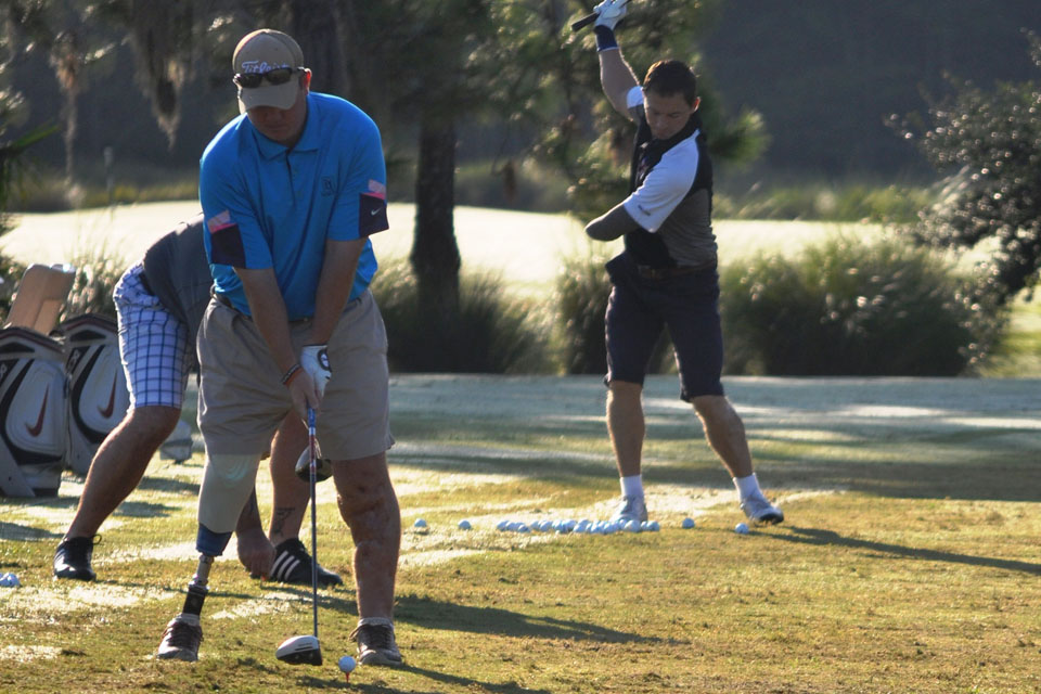 A Battle Back golfer tees up his shot