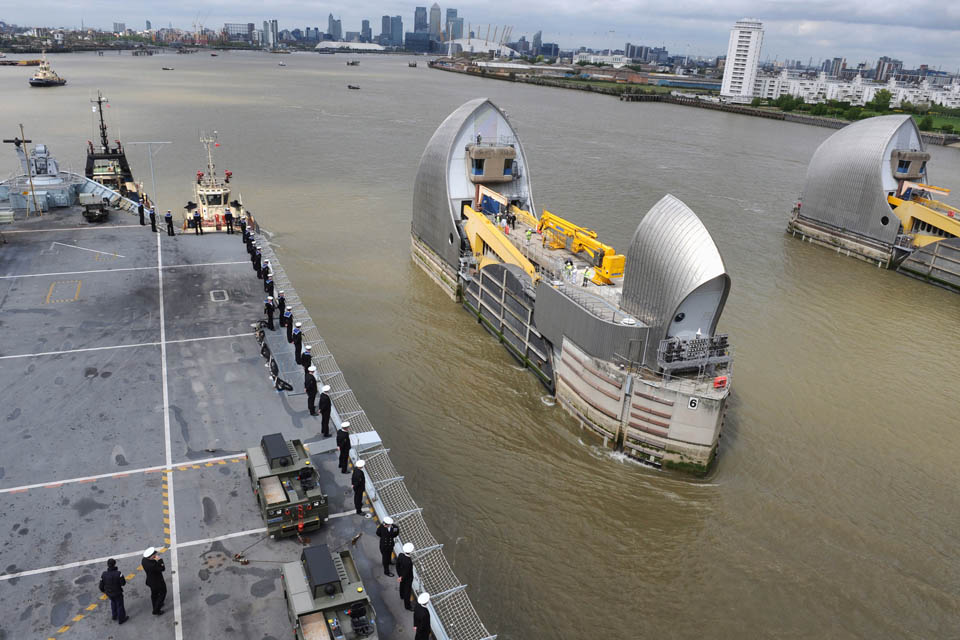 HMS Illustrious transits the Thames Barrier