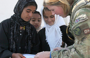 A service woman visiting a school in Gereshk, Helmand province (library image) [Picture: Petty Officer Airman (Photographer) Sean Clee, Crown copyright]