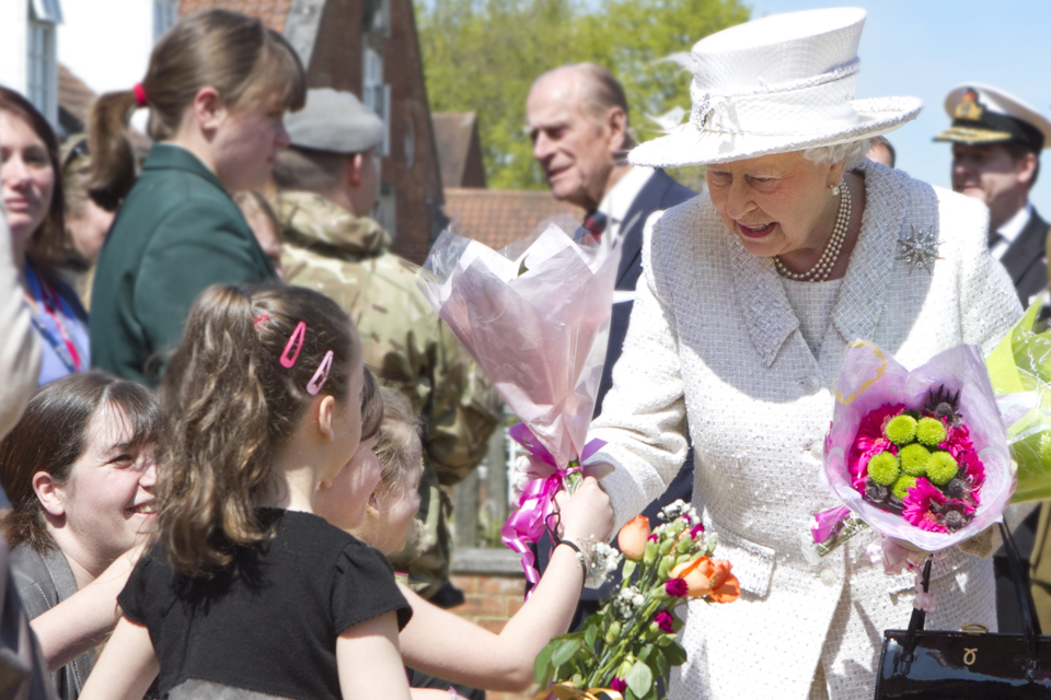 Her Majesty The Queen accepts a posy
