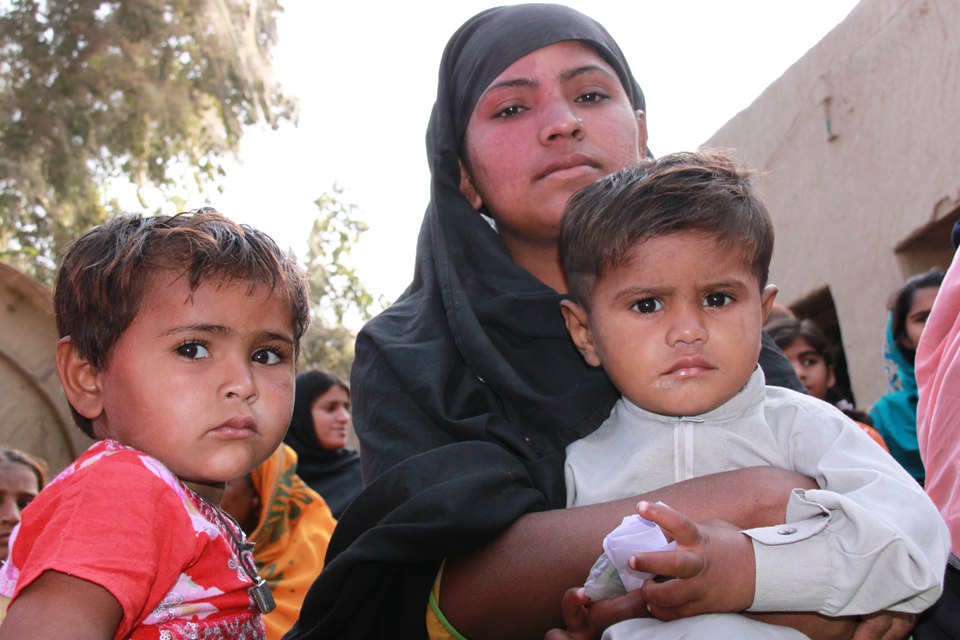 Munawar with two of her children at an International Medical Corps clinic in Sindh province. Picture: Vicki Francis/DFID