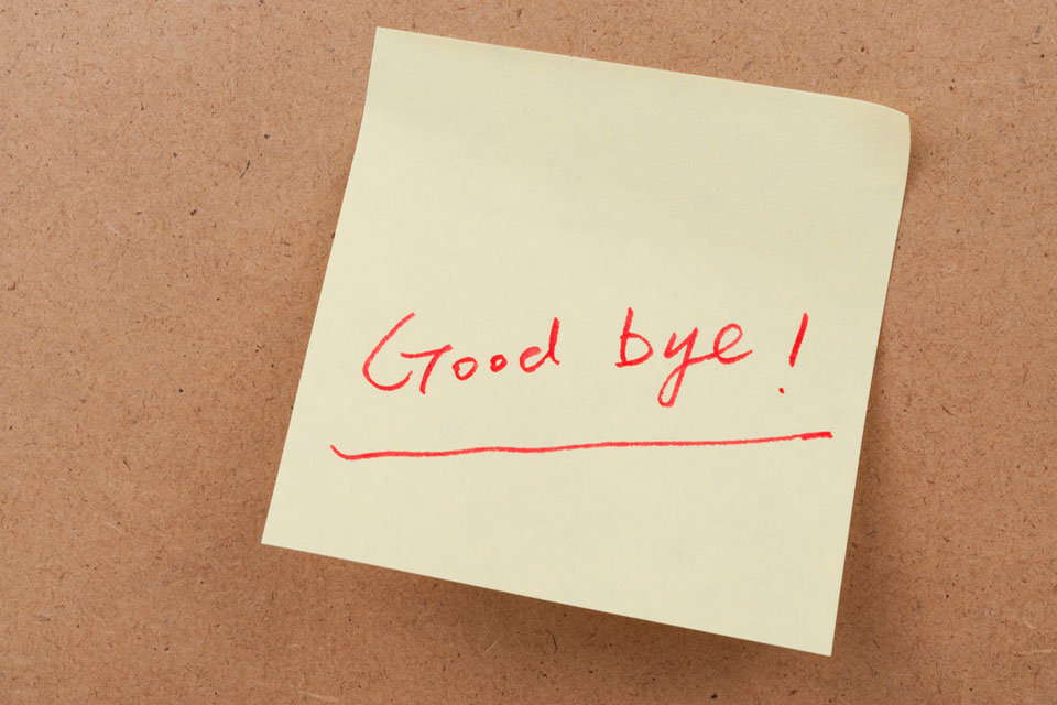Image of a posted note that says good bye.