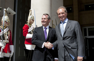 Dr Liam Fox (left) shakes hands with French Defence Minister Gérard Longuet outside the UK Ministry of Defence headquarters in London