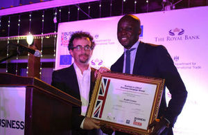 Mr. Kadri Lomo, receiving his ceritifcate from Jon Benjamin, British High Commissioner.