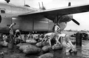 Armourers assemble 500-pound (228kg) medium capacity bombs for loading into Consolidated Liberator B Mark VI, KL654, of 356 Squadron for the squadron's first operational mission, and the first bombing operation flown from Brown's West Island in the Cocos