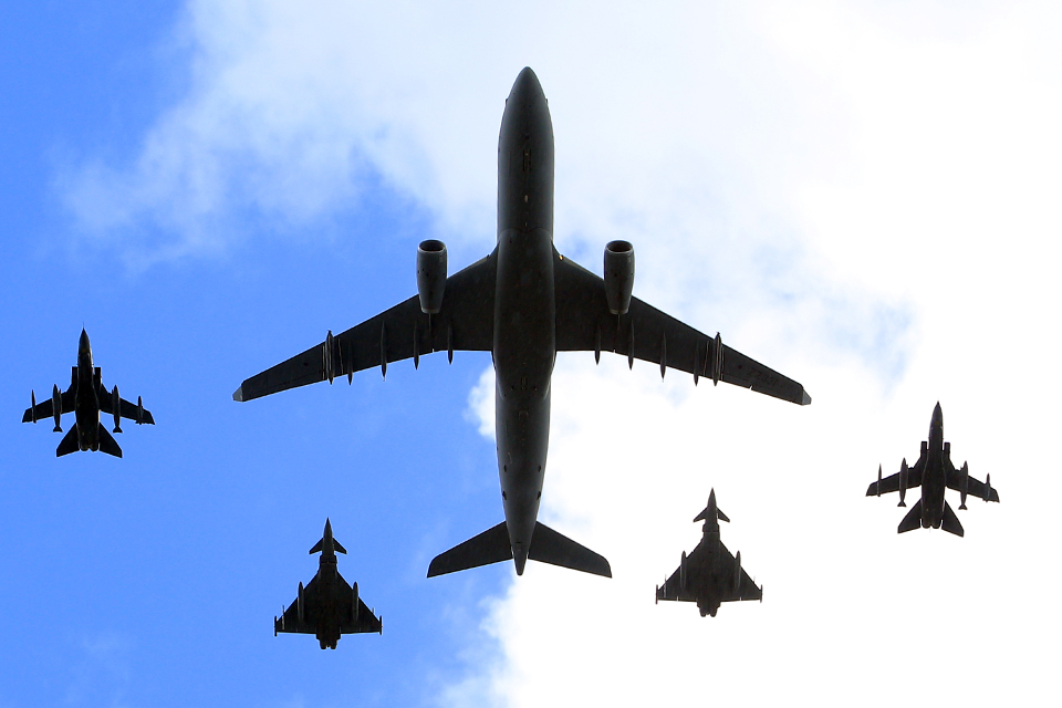 RAF Voyager escorted by Typhoon and Tornado fighter jets
