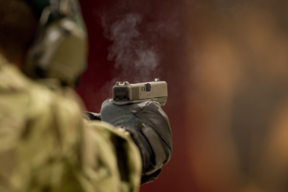 A Glock pistol is fired on a range