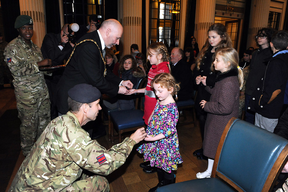 Children receive specially-commissioned medals