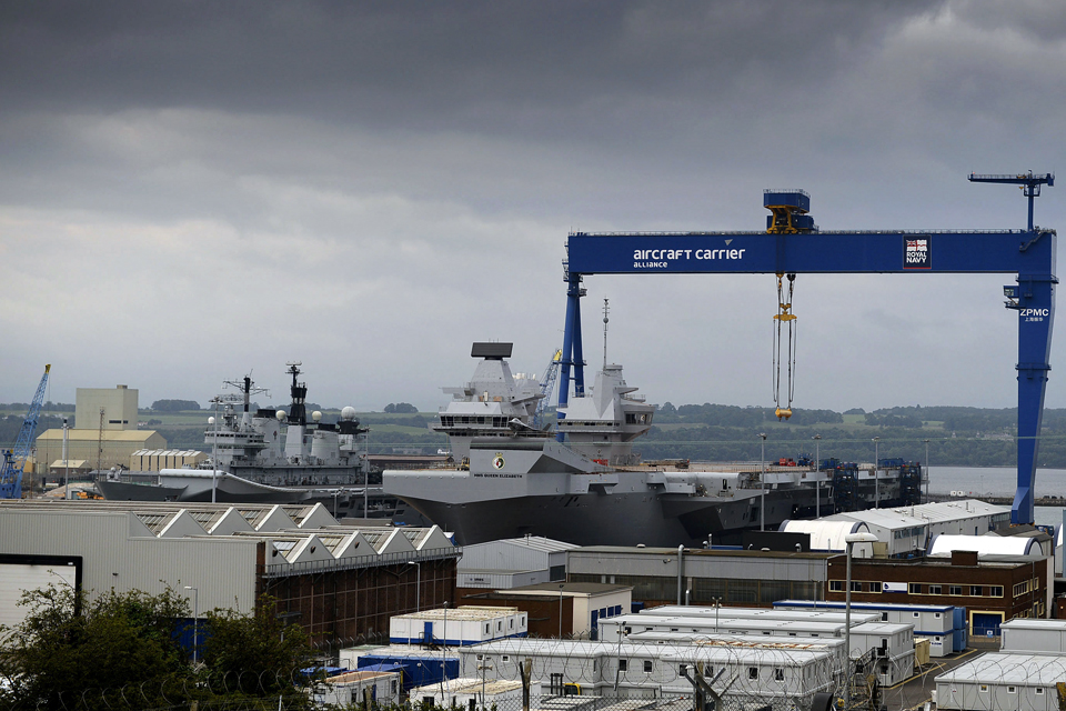 HMS Illustrious alongside the new carrier