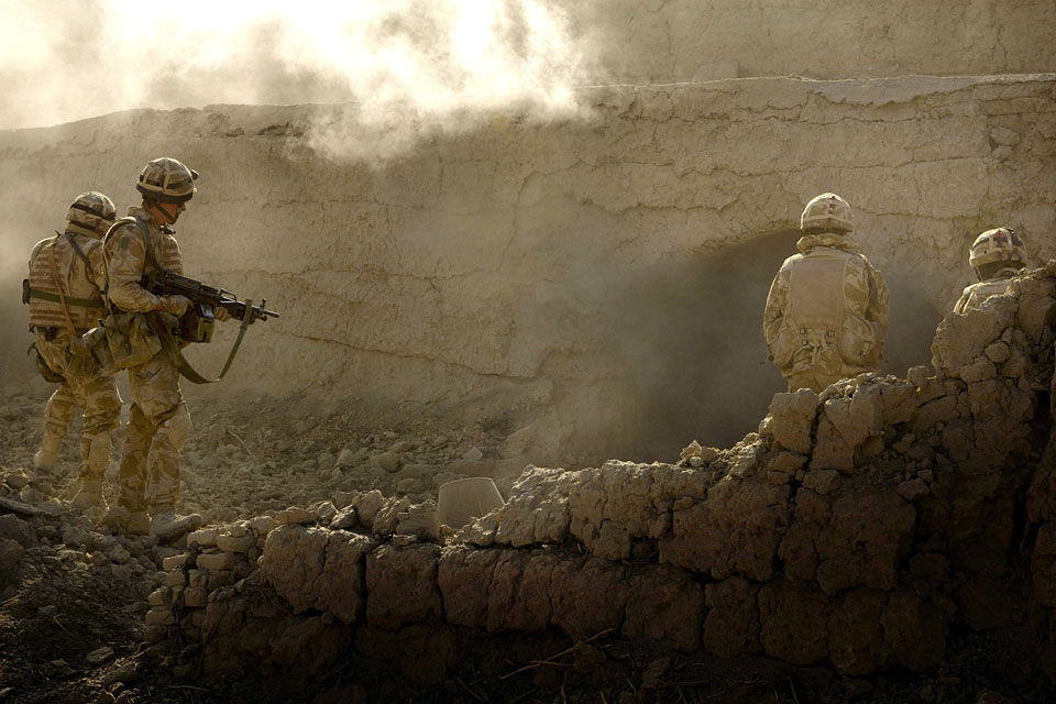 Royal Marines conducting a deliberate action against Taliban insurgents in Afghanistan