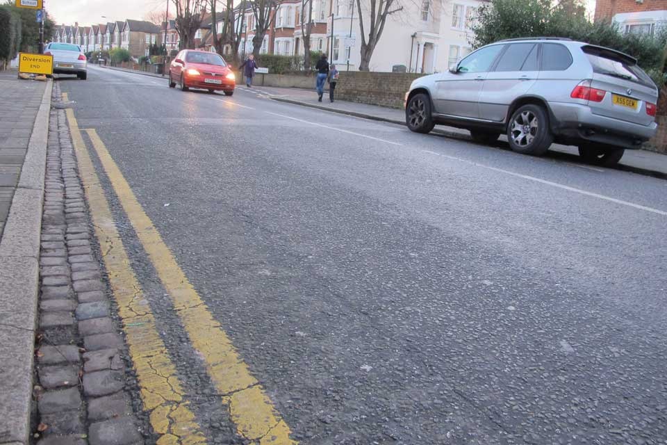 Councils urged to use parking zones to cut yellow lines