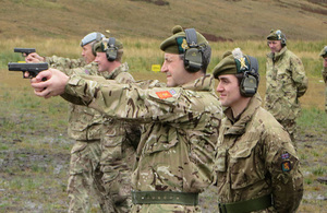 General Bob Bruce, with army reservists from 6 SCOTS, hone their military skills on the new range complex. Crown copyright. All rights reserved.