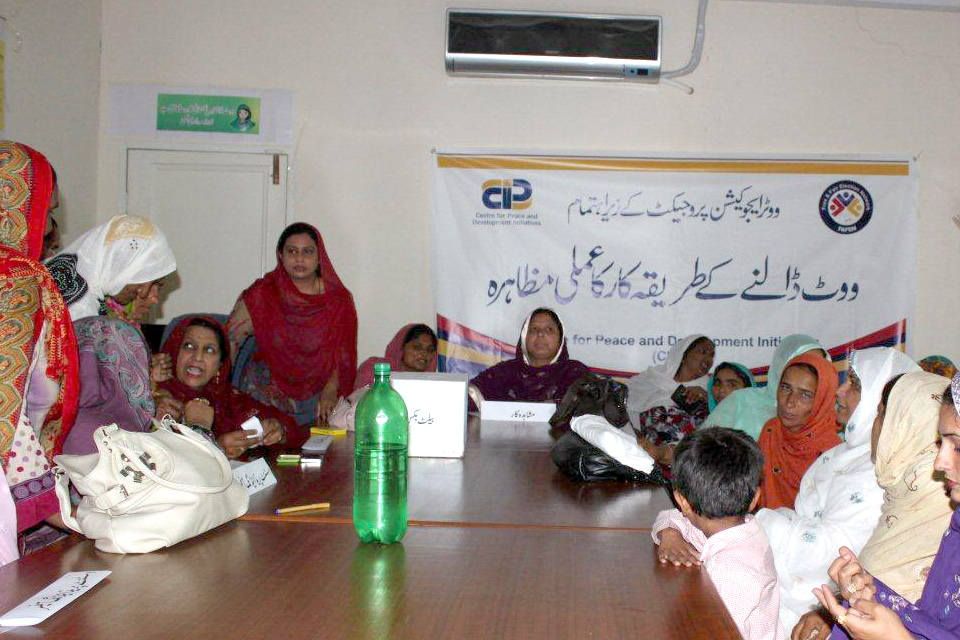 A women's gathering where Kanwal goes through the process on what would take place on election day. Picture: DFID Pakistan