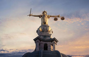 Gold Lady Justice Statue on top of the Old Bailey in London