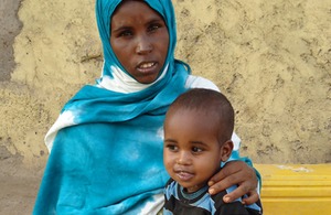 Back to a healthy weight: Two-year-old Ilyas Abdullahi with his mother Faduma. Picture: Ibrahim Bashir/Save the Children