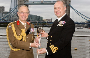 Chief of Defence Staff General Sir David Richards presents the Firmin Sword of Peace to Commander Steve Tatham Royal Navy on behalf of 15 (UK) Psychological Operations Group who have received the award in recognition of their work in Afghanistan